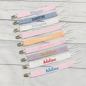 Baby pacifier clip holder